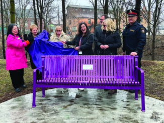 This Chatham bench has a QR code to safety